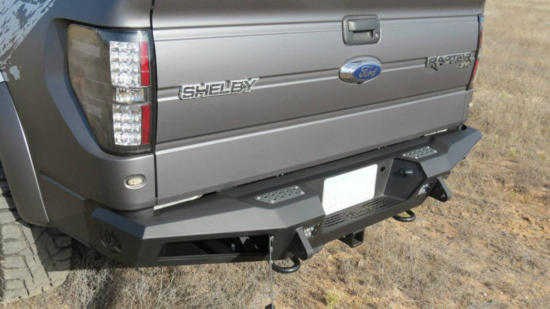 Addictive Desert Designs 10-14 Ford F-150 Raptor HoneyBadger Rear Bumper w/ Tow Hooks Bumpers - Steel Addictive Desert Designs