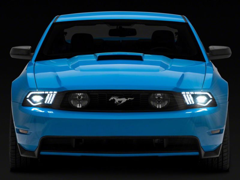Raxiom 10-12 Ford Mustang w/ Factory Halogen LED Projector Headlights- Blk Housing (Clear Lens) Headlights Raxiom