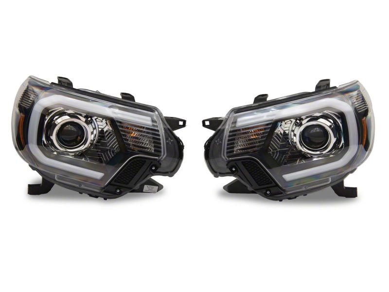 Raxiom 12-15 Toyota Tacoma Axial Projector Headlights w/ SEQL LED Bar- Black Housing (Clear Lens) Headlights Raxiom