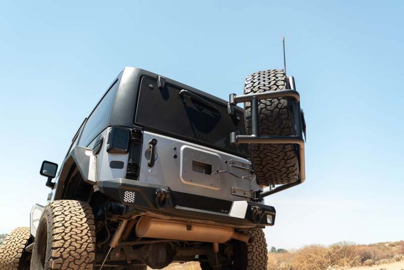 DV8 07-18 Jeep Wrangler JK Body Mounted Tire Carrier Chase Racks DV8 Offroad