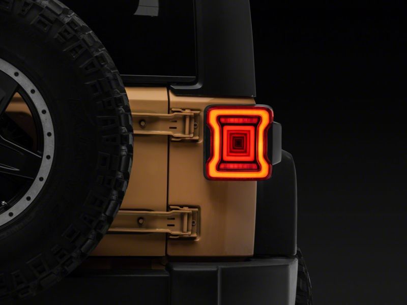 Raxiom 07-18 Jeep Wrangler JK Axial Series JL Style LED Tail Lights- BlkHousing- Red Lens Tail Lights Raxiom
