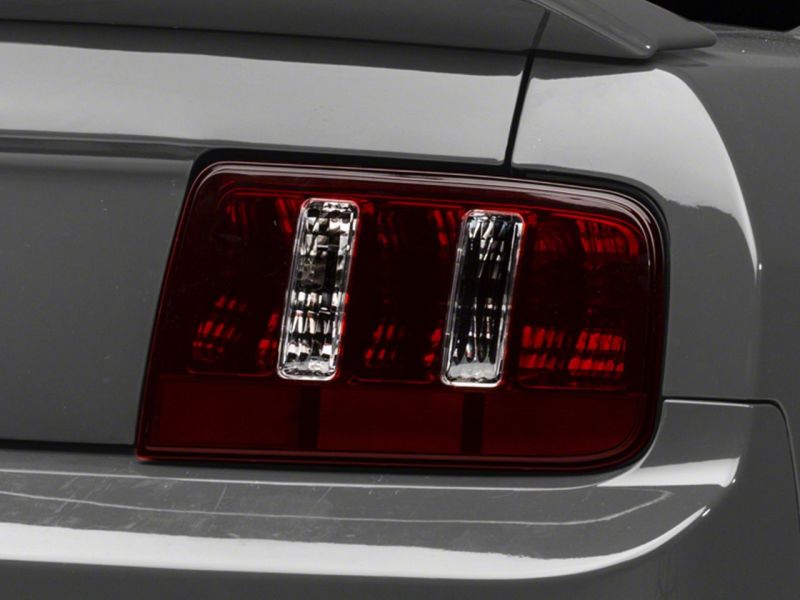 Raxiom 05-09 Ford Mustang Coyote Tail Lights- Blk Housing (Smoked Lens) Tail Lights Raxiom