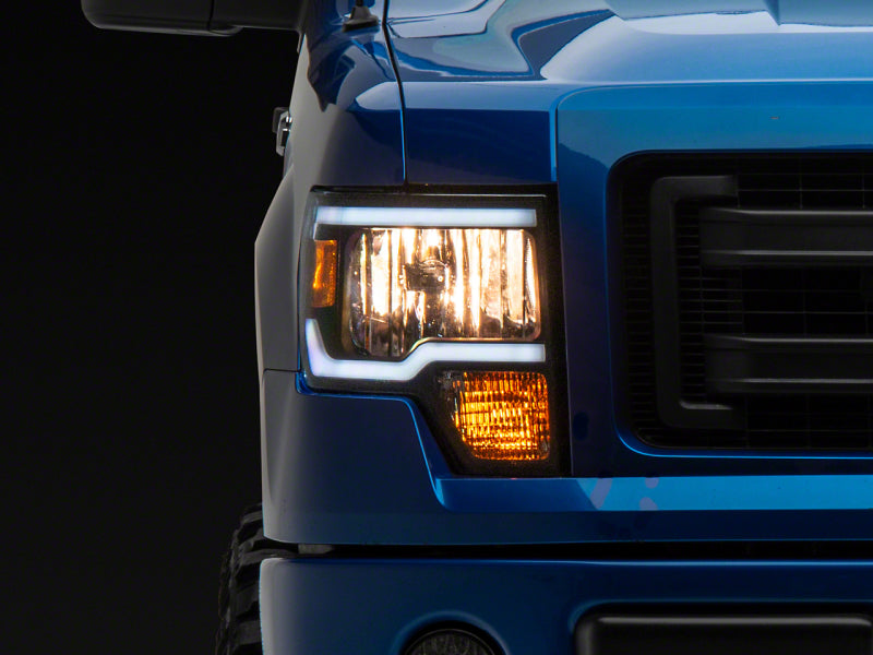 Raxiom 09-14 Ford F-150 Axial Series Headlight w/ SEQL LED Bar- Blk Housing (Clear Lens) Light Bars & Cubes Raxiom