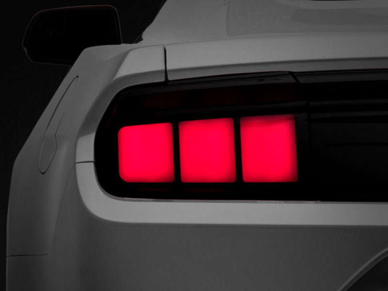 Raxiom 15-22 Ford Mustang Profile LED Tail Lights - Gloss Black Housing (Smoked Lens) Tail Lights Raxiom