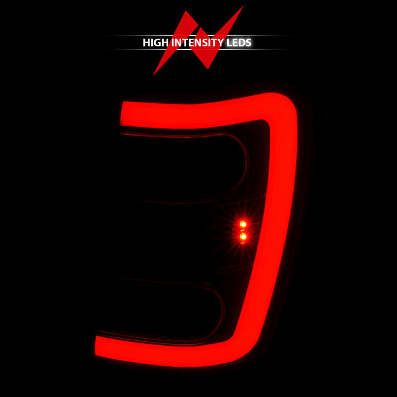 ANZO 1999-2004 Jeep Grand Cherokee LED Tail Lights w/ Light Bar Black Housing Smoke Lens Tail Lights ANZO