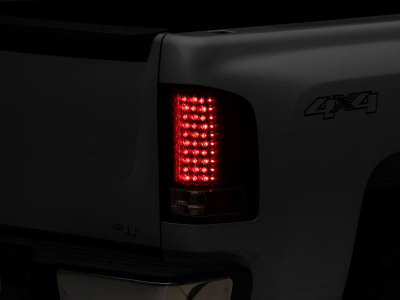 Raxiom 07-13 Chevrolet Silverado 1500 LED Tail Lights- Blk Housing (Clear Lens) Tail Lights Raxiom