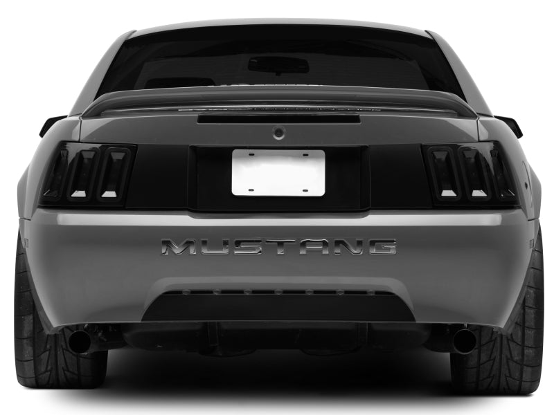Raxiom 99-04 Ford Mustang Excluding 99-01 Cobra Icon LED Tail Lights- Black Housing (Smoked Lens) Tail Lights Raxiom