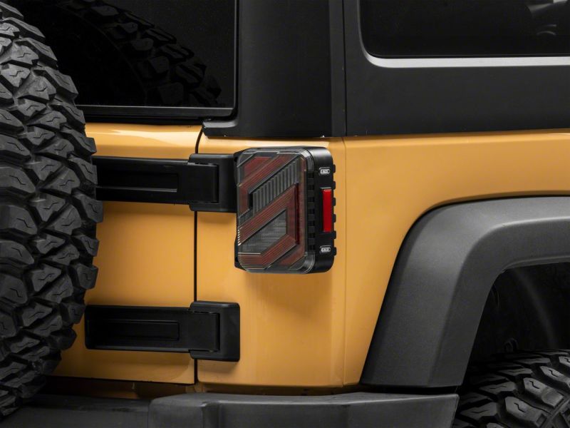 Raxiom 07-18 Jeep Wrangler JK Axial Series Trident LED Tail Lights- Blk Housing (Clear Lens) Tail Lights Raxiom