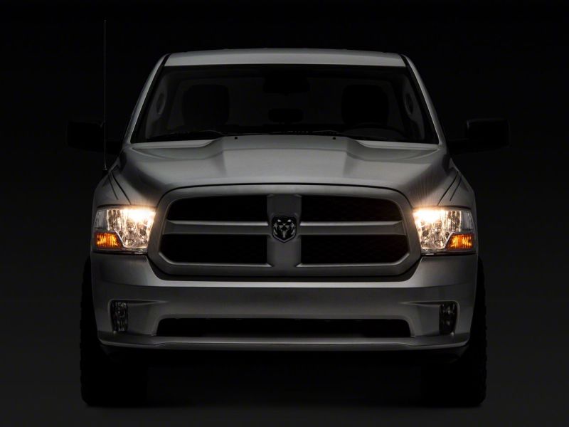 Raxiom 09-18 Dodge RAM 1500 Axial OEM Rep Headlights w/ Single Bulb- Chrome Housing (Clear Lens) Headlights Raxiom