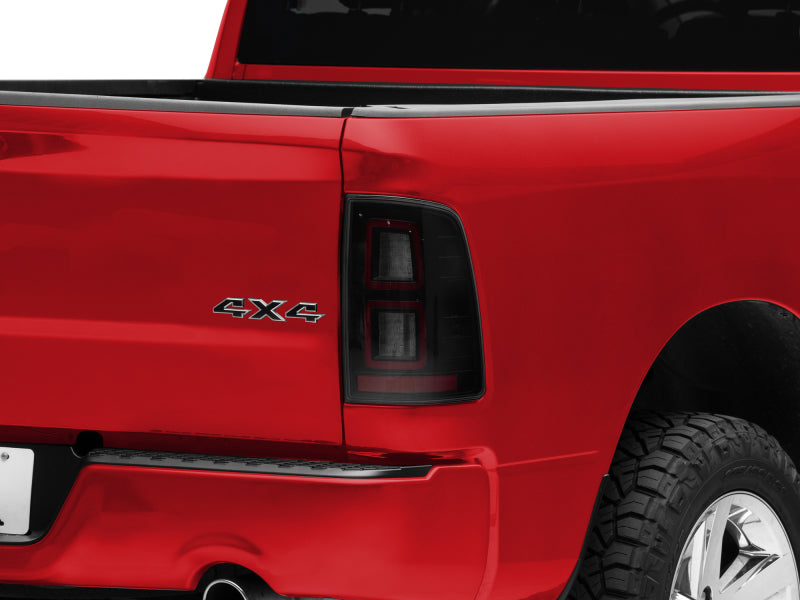 Raxiom 09-18 Dodge RAM 1500 LED Tail Lights- Black Housing (Smoked Lens) Tail Lights Raxiom