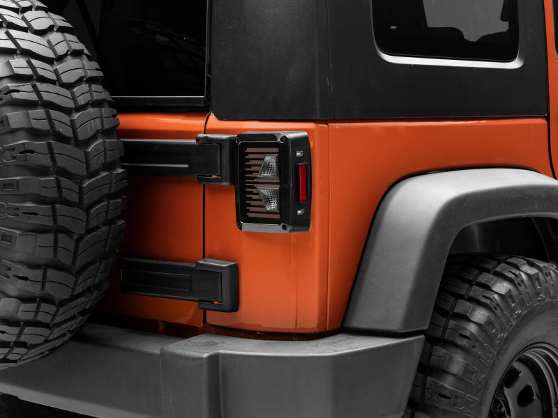 Raxiom 07-18 Jeep Wrangler JK Axial Series Vision LED Tail Lights- Black Housing (Smoked Lens) Tail Lights Raxiom