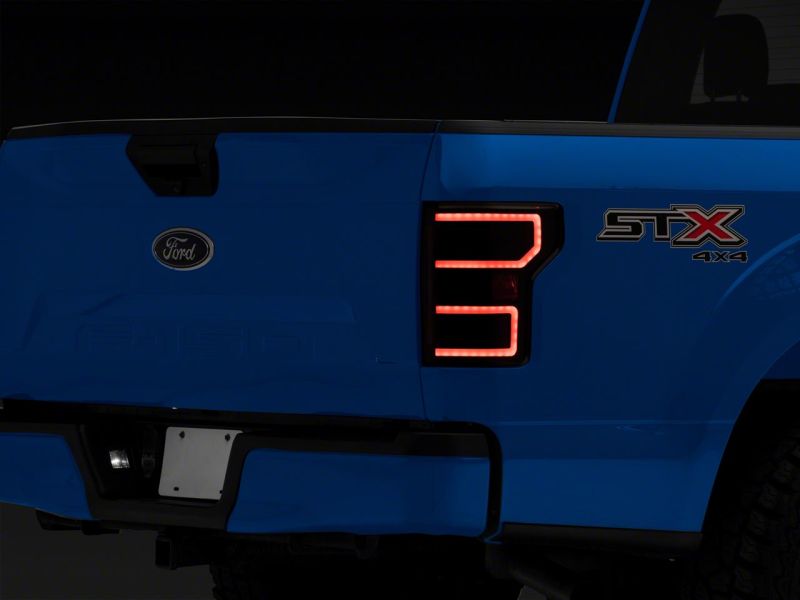 Raxiom 18-20 Ford F-150 Axial Series LED Tail Lights w/ SEQL Turn Signals- Blk Housing (Clear Lens) Tail Lights Raxiom