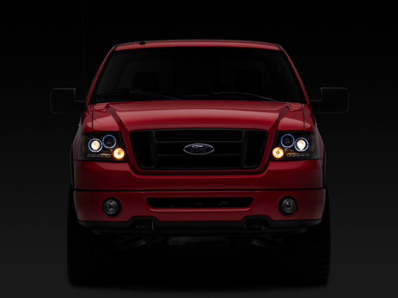 Raxiom 04-08 Ford F-150 Dual LED Halo Projector Headlights- Black Housing (Clear Lens) Headlights Raxiom