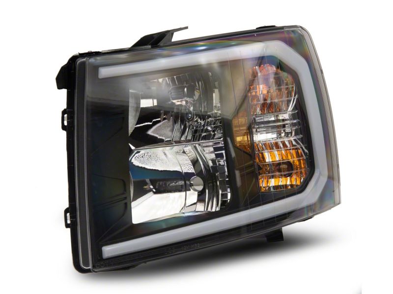 Raxiom 07-13 Chevrolet Silverado 1500 Axial Headlights w/ SEQL LED Bar- Black Housing (Clear Lens) Headlights Raxiom