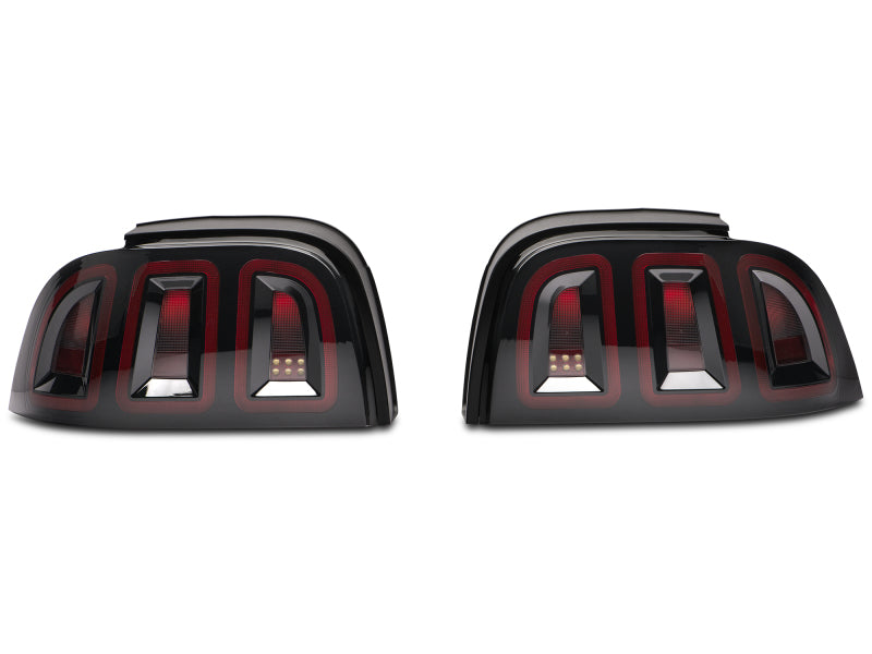 Raxiom 96-98 Ford Mustang Icon LED Tail Lights- Black Housing (Smoked Lens) Tail Lights Raxiom