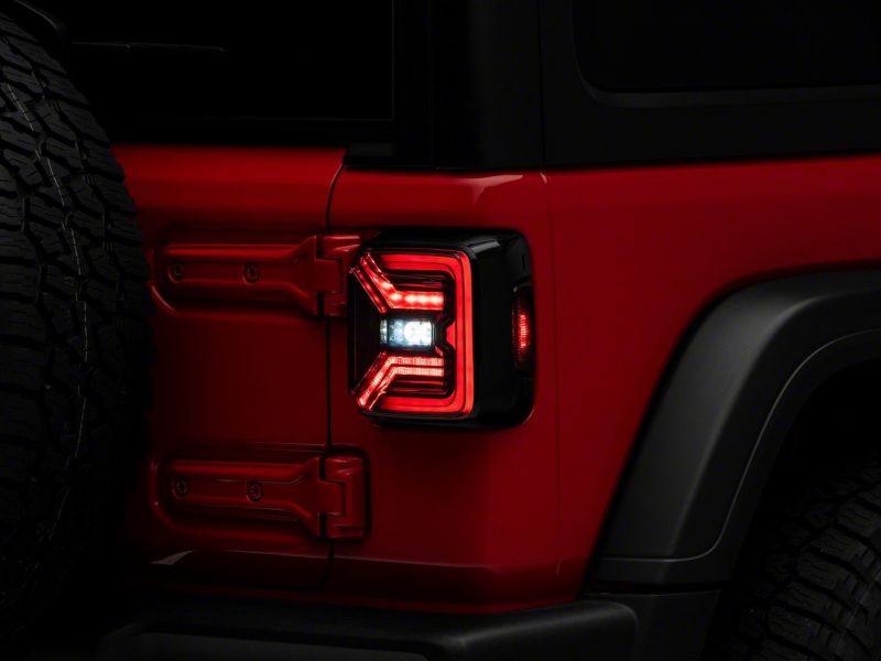 Raxiom 18-23 Jeep Wrangler JL Axial Series LED Tail Lights- Blk Housing (Smoked Lens) Tail Lights Raxiom