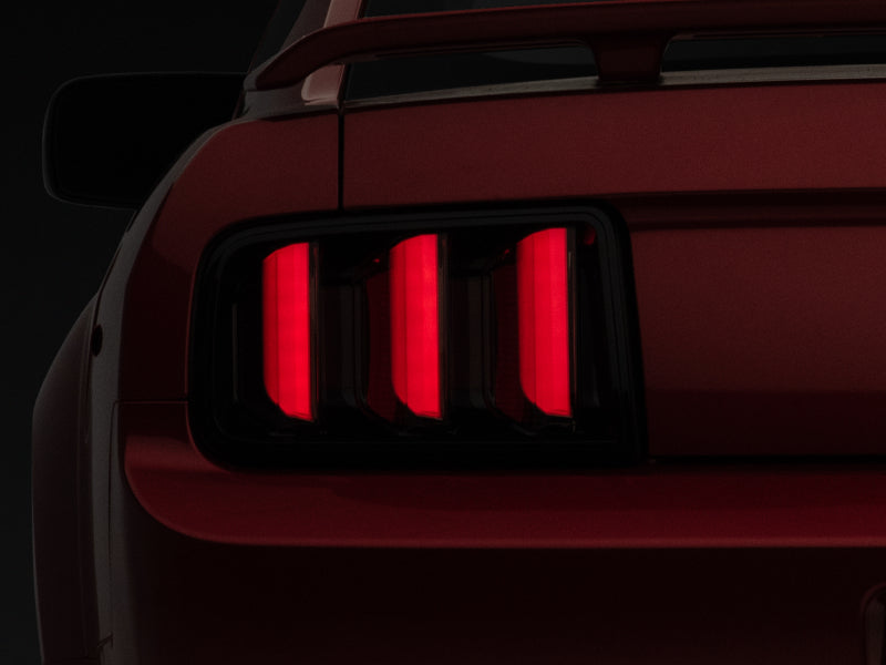 Raxiom 05-09 Ford Mustang Vector V2 LED Tail Lights- Black Housing (Smoked Lens) Tail Lights Raxiom