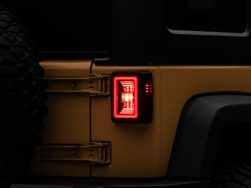 Raxiom 07-18 Jeep Wrangler JK JL Style LED Tail Lights- Black Housing - Red Lens Tail Lights Raxiom