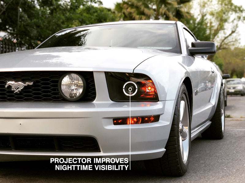 Raxiom 05-09 Ford Mustang Halogen 2010 Style LED Halo Headlights-Blk Hsng(Clear Lens/Excludes GT500) Headlights Raxiom
