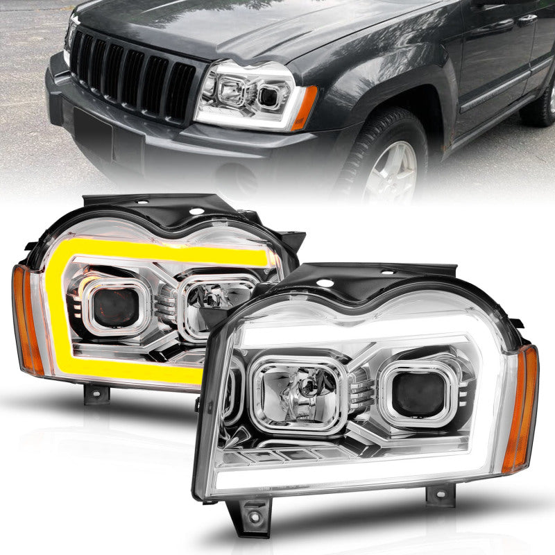 ANZO 05-07 Jeep Grand Cherokee Projector Headlights - w/ Light Bar Switchback Chrome Housing Headlights ANZO