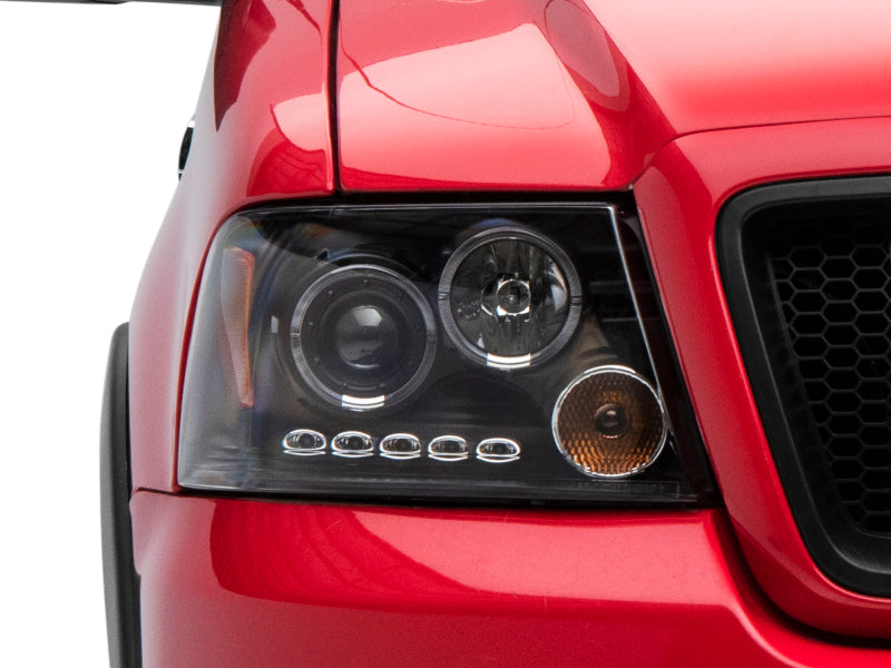 Raxiom 04-08 Ford F-150 Dual LED Halo Projector Headlights- Black Housing (Clear Lens) Headlights Raxiom