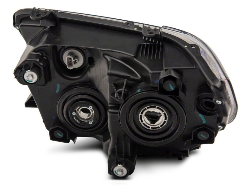 Raxiom 07-13 Toyota Tundra Axial Projector Headlights w/ SEQL LED Bar- Black Housing (Clear Lens) Headlights Raxiom