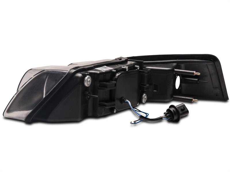 Raxiom 99-04 Ford Mustang Dual LED Halo Projector Headlights- Black Housing (Clear Lens) Headlights Raxiom