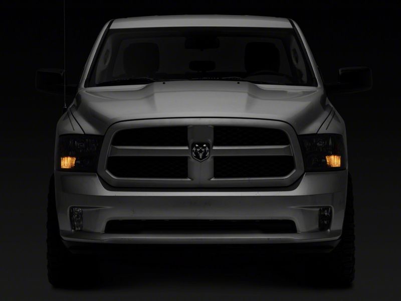 Raxiom 09-18 Dodge RAM 1500 Axial Series Euro Style Headlights w/ Dual Bulb Blk Housing (Clear Lens) Headlights Raxiom