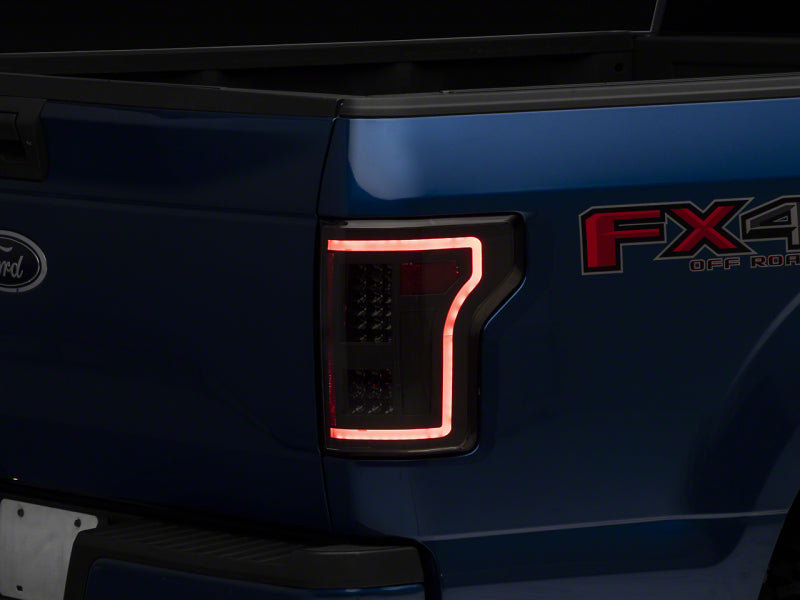 Raxiom 15-17 Ford F-150 LED Tail Lights w/ SEQL Turn Signals- Blk Housing (Clear Lens) Tail Lights Raxiom