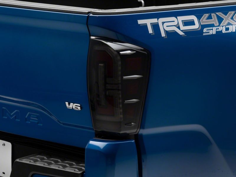 Raxiom 16-23 Toyota Tacoma LED Tail Lights- Blk Housing (Smoked Lens) Tail Lights Raxiom