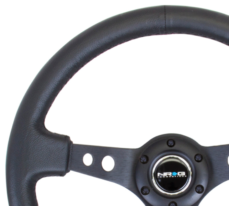 NRG Reinforced Steering Wheel (350mm / 3in. Deep) Blk Leather w/Blk Spoke & Circle Cutouts Steering Wheels NRG