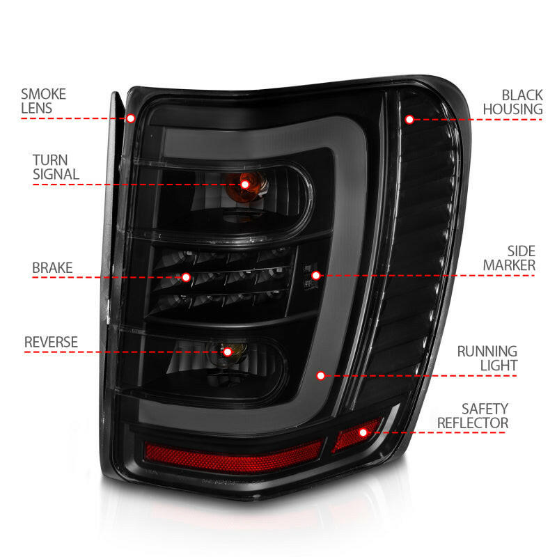 ANZO 1999-2004 Jeep Grand Cherokee LED Tail Lights w/ Light Bar Black Housing Smoke Lens Tail Lights ANZO