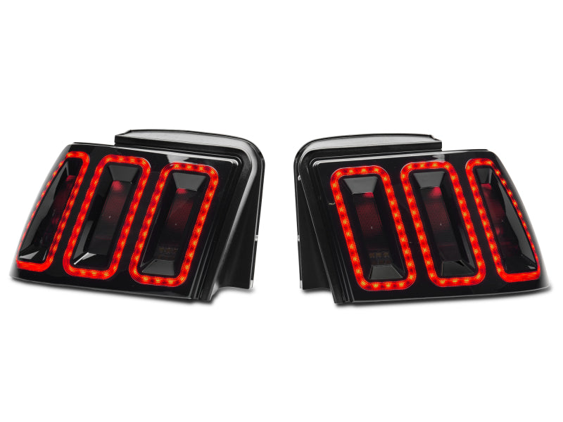 Raxiom 99-04 Ford Mustang Excluding 99-01 Cobra Icon LED Tail Lights- Black Housing (Smoked Lens) Tail Lights Raxiom
