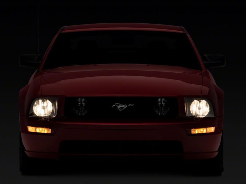 Raxiom 05-09 Ford Mustang Axial Series OEM Style Rep Headlights- Chrome Housing- Smoked Lens Headlights Raxiom