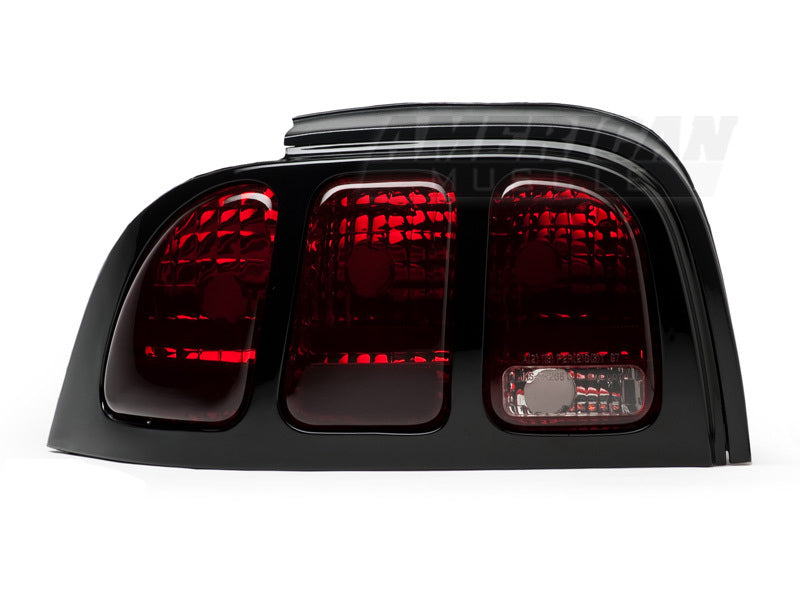 Raxiom 96-98 Ford Mustang Tail Lights- Black Housing (Smoked Lens) Tail Lights Raxiom
