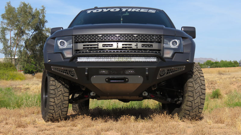 Addictive Desert Designs 10-14 Ford F-150 Raptor HoneyBadger Front Bumper w/ Winch Mount Bumpers - Steel Addictive Desert Designs