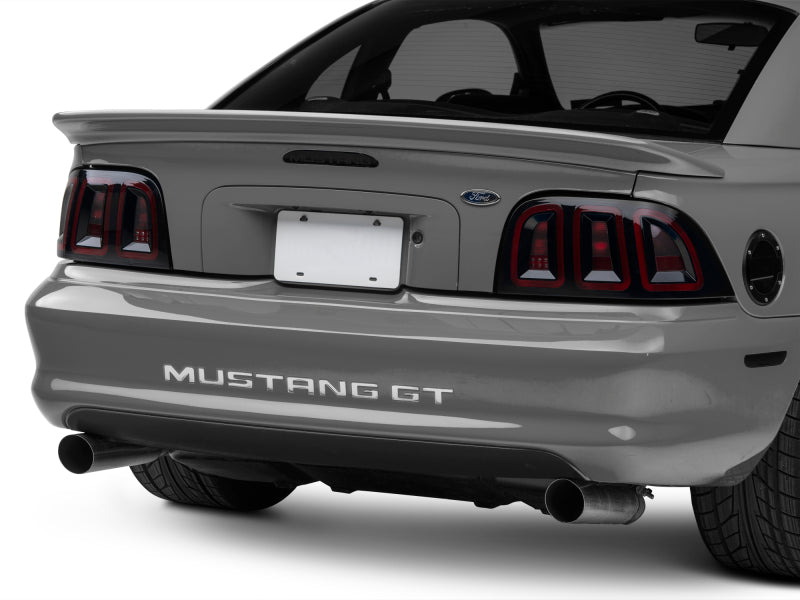 Raxiom 96-98 Ford Mustang Icon LED Tail Lights- Black Housing (Smoked Lens) Tail Lights Raxiom