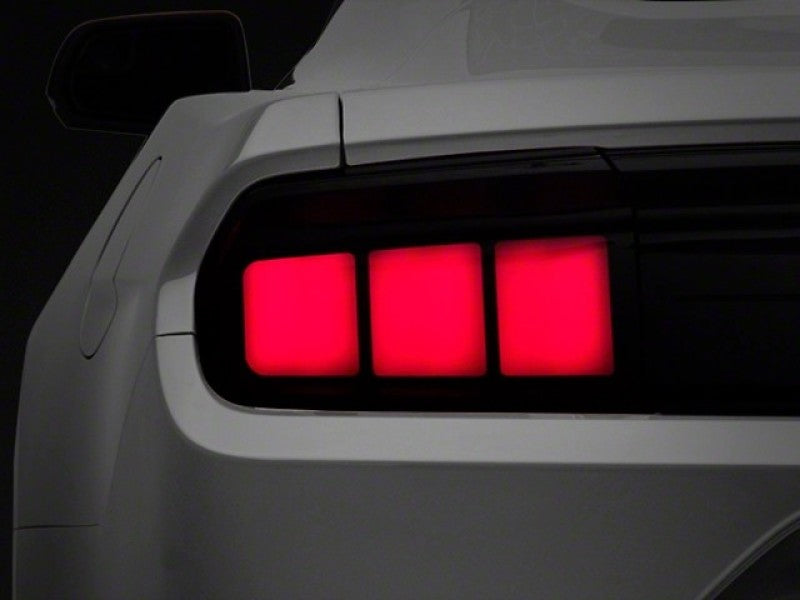 Raxiom 15-22 Ford Mustang Profile LED Tail Lights - Gloss Black Housing (Smoked Lens) Tail Lights Raxiom