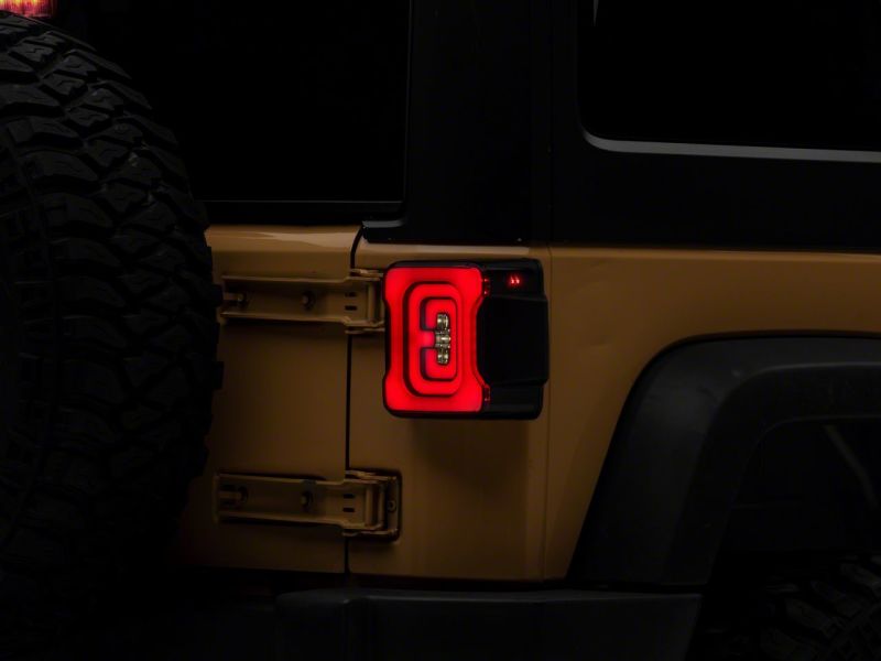 Raxiom 07-18 Jeep Wrangler JK Axial Series Carver LED Tail Lights- Blk Housing (Smoked Lens) Tail Lights Raxiom