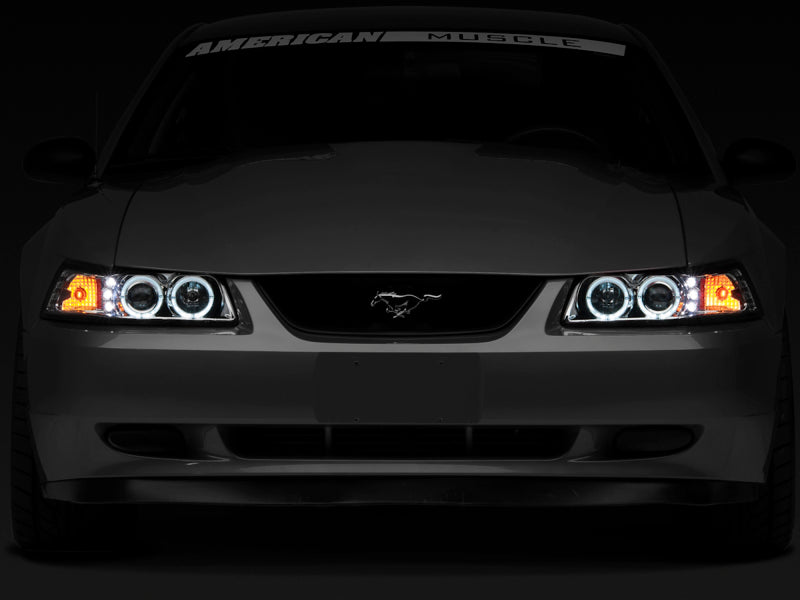 Raxiom 99-04 Ford Mustang Dual LED Halo Projector Headlights- Chrome Housing (Clear Lens) Headlights Raxiom