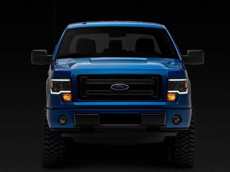 Raxiom 09-14 Ford F-150 Axial Series Headlight w/ SEQL LED Bar- Blk Housing (Clear Lens) Light Bars & Cubes Raxiom