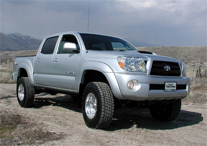 Tuff Country 05-23 Toyota Tacoma 4x4 & PreRunner 3in Lift Kit (Excludes TRD Pro) SX6000 Shocks Lift Kits Tuff Country