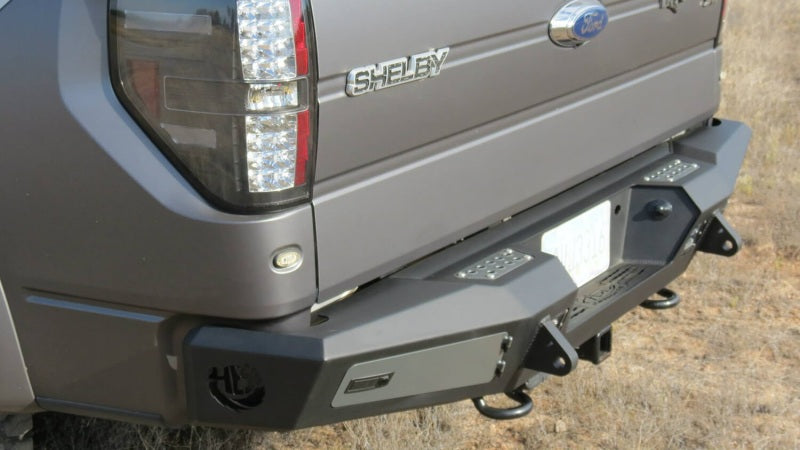 Addictive Desert Designs 10-14 Ford F-150 Raptor HoneyBadger Rear Bumper w/ Tow Hooks Bumpers - Steel Addictive Desert Designs