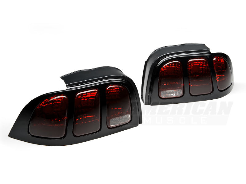 Raxiom 96-98 Ford Mustang Tail Lights- Black Housing (Smoked Lens) Tail Lights Raxiom