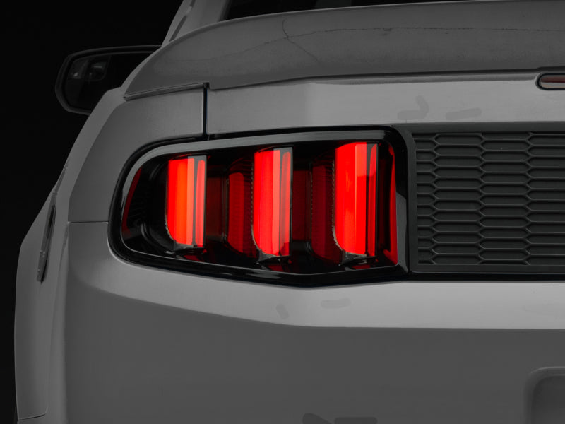 Raxiom 10-12 Ford Mustang Vector V2 LED Tail Lights - Gloss Black Housing (Clear Lens) Tail Lights Raxiom