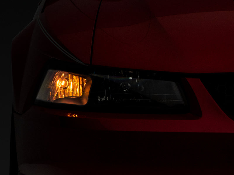 Raxiom 99-04 Mustang Axial Series OEM Style Replacement Headlights- Black Housing (Clear Lens) Headlights Raxiom