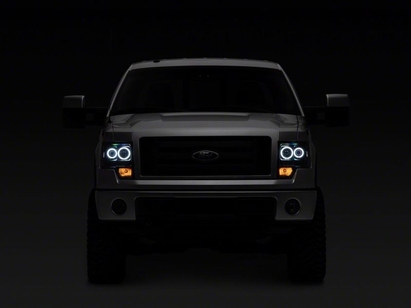 Raxiom 09-14 Ford F-150 Super White LED Halo Projector Headlights- Black Housing (Clear Lens) Headlights Raxiom