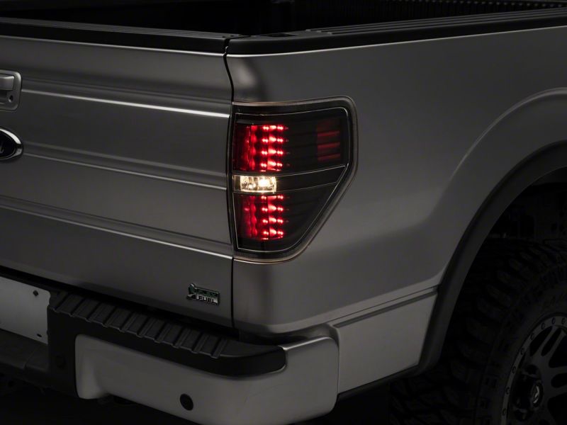 Raxiom 09-14 Ford F-150 Styleside LED Tail Lights- Blk Housing (Clear Lens) Tail Lights Raxiom