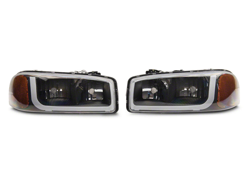 Raxiom 99-06 GMC Sierra 1500 Axial Series Headlights w/ LED Bar- Blk Housing (Clear Lens) Headlights Raxiom