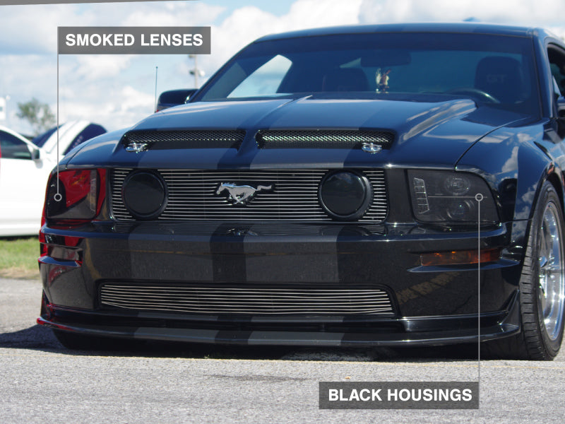 Raxiom 05-09 Ford Mustang w/ Halogen LED Halo Prjctr Headlights-Blk Hsng(Smoked Lens Exclude GT500) Headlights Raxiom